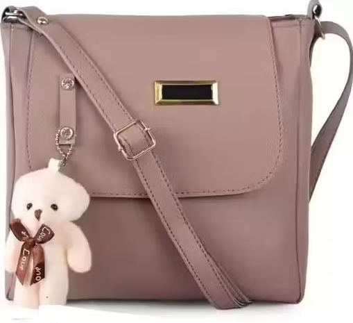 woman siling cross body bag teddy mause